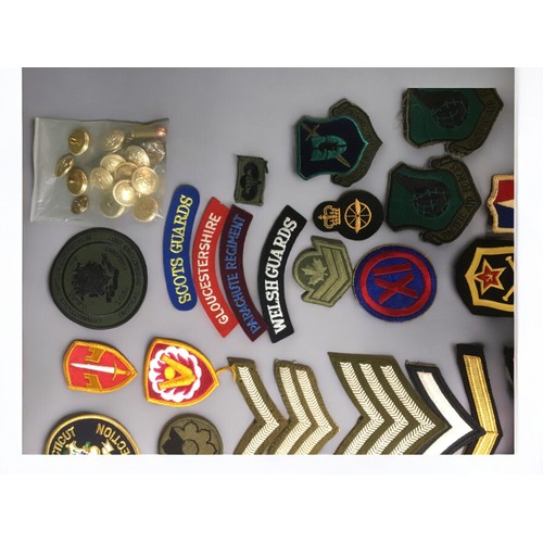 194 - Large Collection of WW2 and Later Military Badges, Buttons, Pins, Cap Badges. British and American. ... 