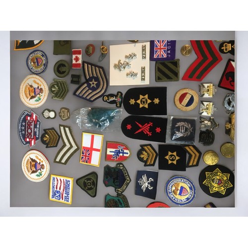 194 - Large Collection of WW2 and Later Military Badges, Buttons, Pins, Cap Badges. British and American. ... 