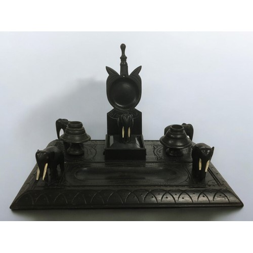 15 - Anglo Indian Ebony Desk Standish having carved Elephant Figural Decoration.