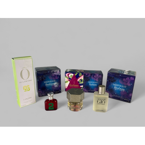 528 - A collection of seven perfumes & colognes.Including Ralph Lauren Polo, YSL, Aqua Di Gio, De Lanc... 