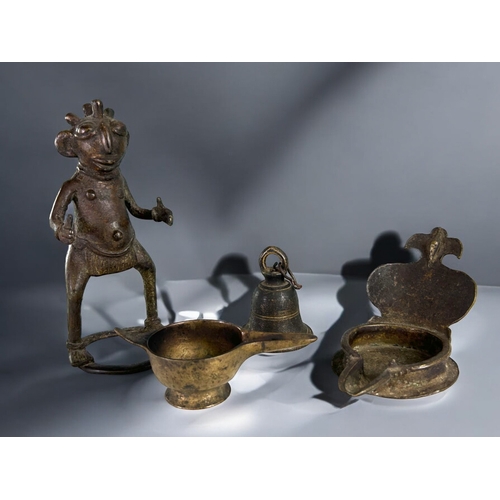 437 - A miscellaneous collection of antique & vintage bronzes.Including an Indian Diya oil lamp, Nepal... 