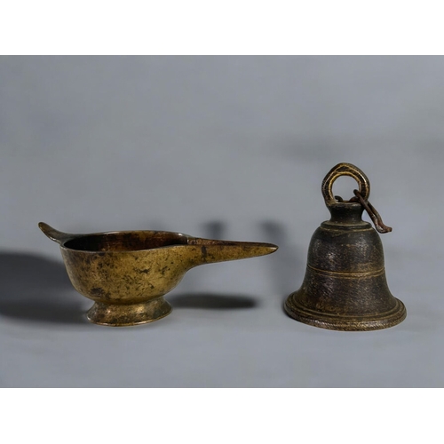 437 - A miscellaneous collection of antique & vintage bronzes.Including an Indian Diya oil lamp, Nepal... 