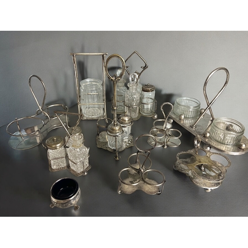 517 - A collection of 19th century silver plate condiment sets & stands. In the manner of Christopher ... 