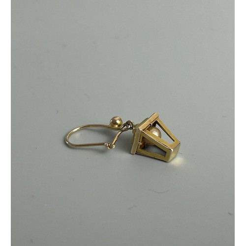 610 - A pair of 9ct gold lantern earrings.stamped on ear wire.Length - 25mm