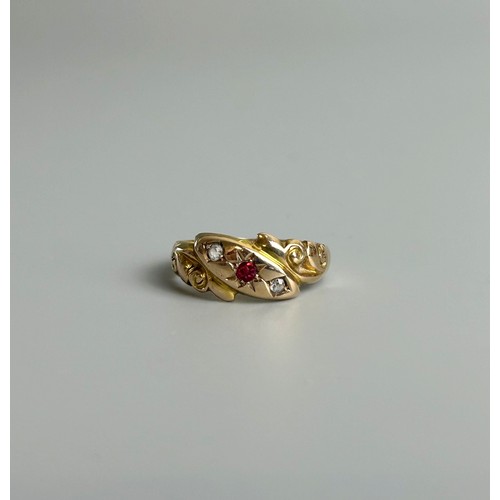 625 - A 1918 9ct gold ring, red and clear stones.Approx Size I