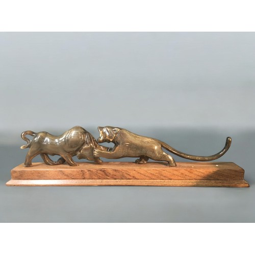 77 - A Middle Eastern Carved Horn Figure Group of Tiger attacking a buffalo.