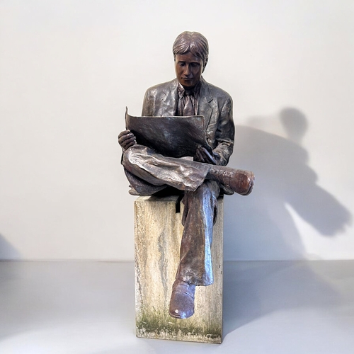 440 - A life size Bronze statue 'The Oxford student'.Depicting a 1930's style student / gentleman reading ... 