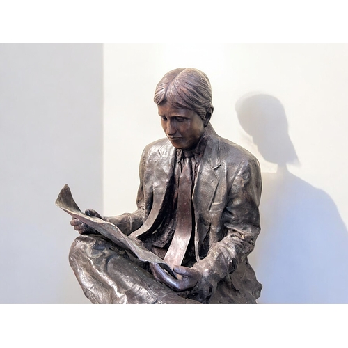 440 - A life size Bronze statue 'The Oxford student'.Depicting a 1930's style student / gentleman reading ... 