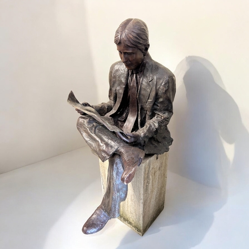 440 - A life size Bronze statue 'The Oxford student'.Depicting a 1930's style student / gentleman reading ... 