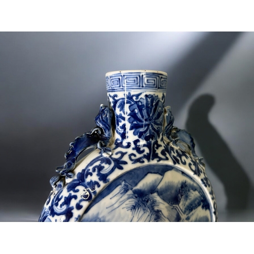 78 - A Chinese blue & white porcelain Pilgrim vase / moon flask.Qing dynasty, 19th century.Each side ... 