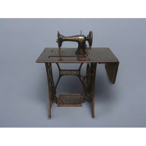 453 - Singer Sewing Machine and Stand Ser No 1679427 Date 1874. Sphinx Decals original and worn.H 74cm x W... 