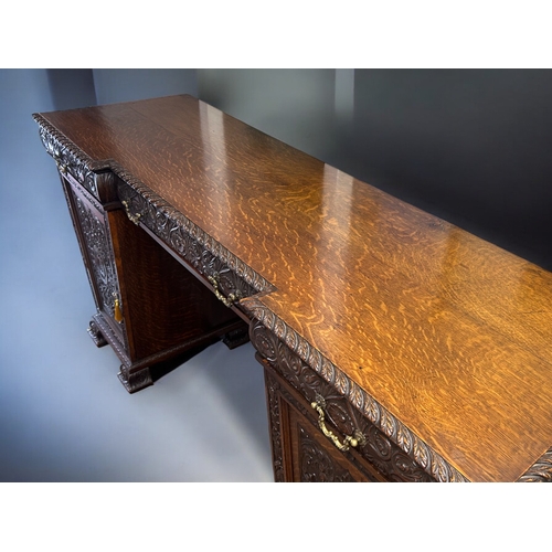 111 - Victorian Druce & Co Oak buffet sideboard.Twin pedestal design, heavily carved scrolling design.... 