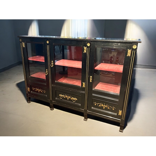 112 - A Victorian Ebonised Credenza display cabinet.Gilt ornament designs with brass handles. Velvet lined... 