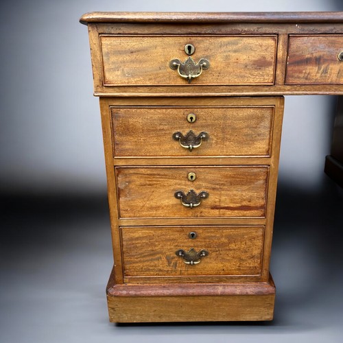 119 - A large Irish Oak twin pedestal partners desk.Robert Strahan of Dublin, Circa 1850.With opposing fou... 