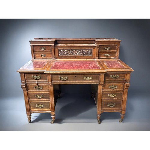 122 - A Victorian pedestal desk.Each pedestal set with three drawers. Further drawers to top gallery with ... 