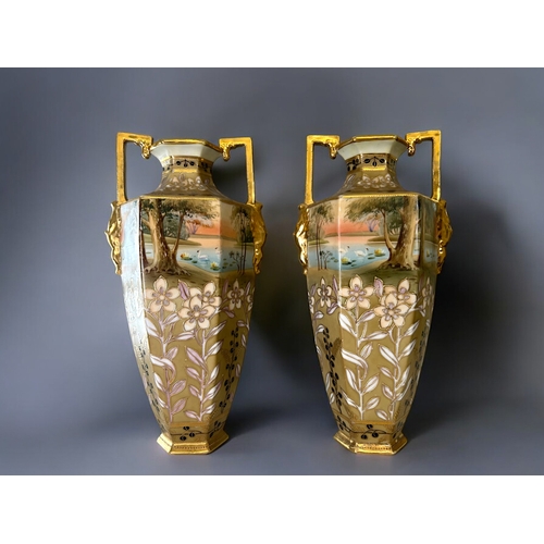 40 - A large pair of Noritake porcelain vase.Hand painted Swans on lake landscape, above gilt edged folia... 