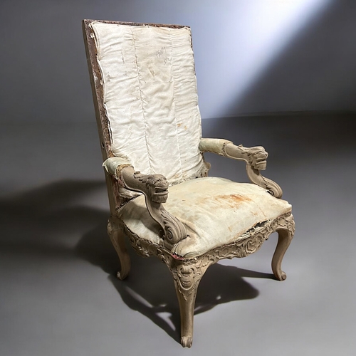 134 - A 19th century French carved Armchair.Carved figural Lion rests, with carved Rococo style rocaille d... 