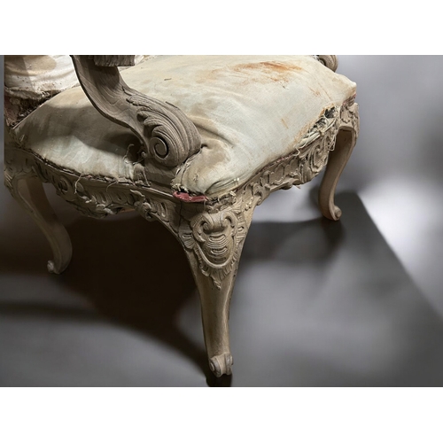 134 - A 19th century French carved Armchair.Carved figural Lion rests, with carved Rococo style rocaille d... 