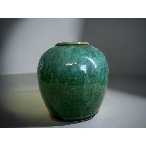 80 - A Chinese green glazed 'Shiwan' pottery jar.Qing dynasty.Height - 16cm