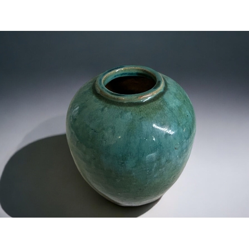 80 - A Chinese green glazed 'Shiwan' pottery jar.Qing dynasty.Height - 16cm