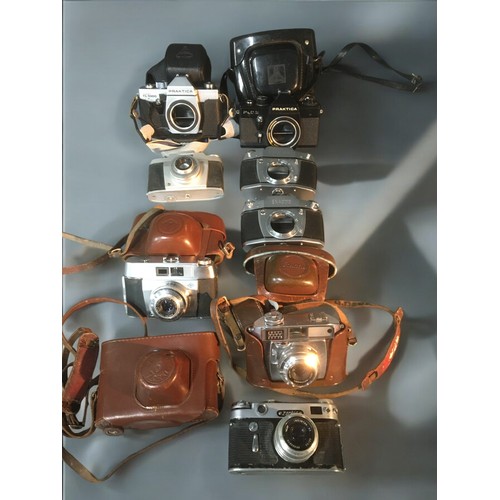 191 - Vintage 35mm Cameras x 8!1. Zorki 6 with Case2. Praktica Super TL 10003. Praktica PLC 24. EXA 5005. ... 