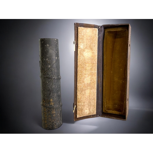 86 - A large Chinese 'Bamboo' form Ink stick.Qing dynasty. Low relief, partially gilded Orchids. With cal... 