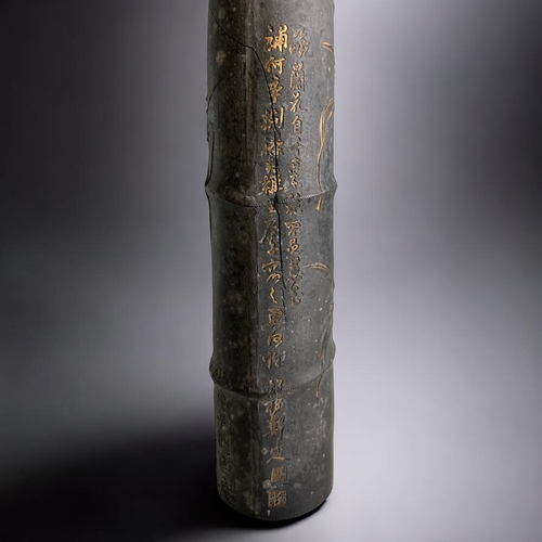 86 - A large Chinese 'Bamboo' form Ink stick.Qing dynasty. Low relief, partially gilded Orchids. With cal... 