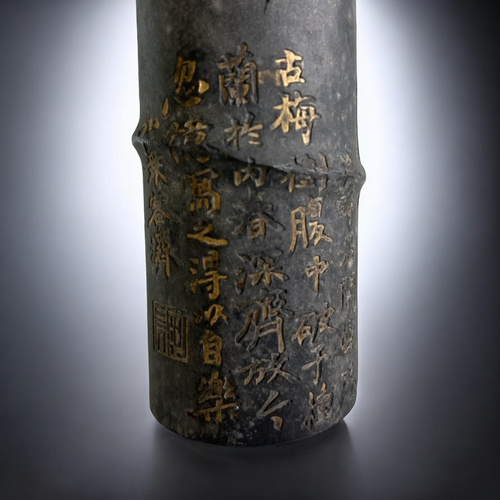 86 - A large Chinese 'Bamboo' form Ink stick.Qing dynasty. Low relief, partially gilded Orchids. With cal... 