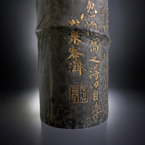 86 - A large Chinese 'Bamboo' form Ink stick.Qing dynasty. Low relief, partially gilded Orchids. With cal... 