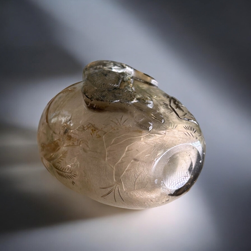 56 - Chinese Smoky Rock crystal snuff bottle.Qing dynasty, 19th century.Carved with a leaping horse below... 