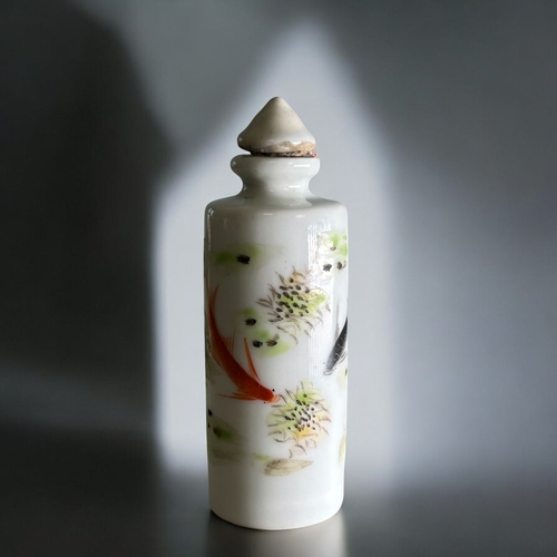 57 - Chinese porcelain snuff bottle decorated with a continuous scene of koi carp.Qing dynasty.Provenance... 