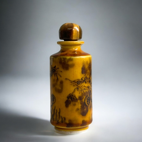 58 - Unusual Chinese porcelain snuff bottle of cylindrical form decorated in underglaze brown with a drag... 