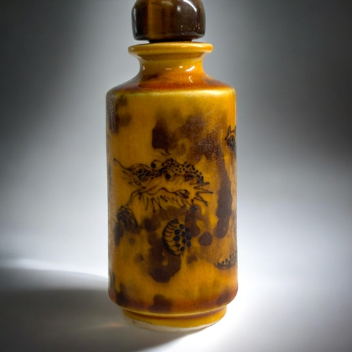 58 - Unusual Chinese porcelain snuff bottle of cylindrical form decorated in underglaze brown with a drag... 