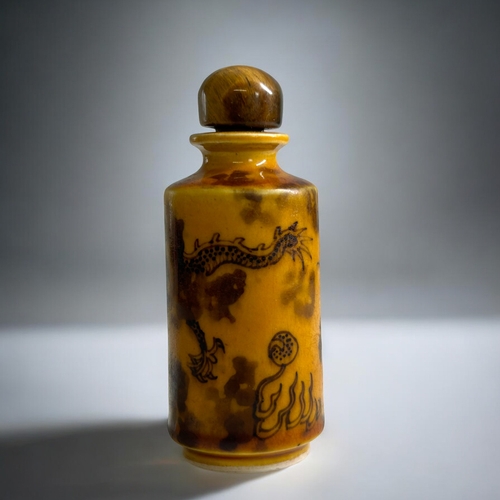 58 - Unusual Chinese porcelain snuff bottle of cylindrical form decorated in underglaze brown with a drag... 