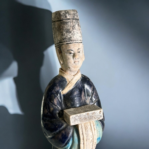 83 - A large Chinese Ming style Tomb attendant.Blue & Turquoise painted, with unglazed removable head... 