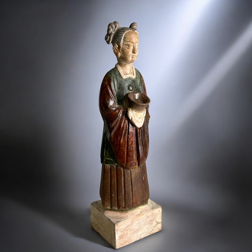 91 - A Chinese Tang style Court attendant.Green & Russet glazed. On raised plinth.Height - 35.5cm... 