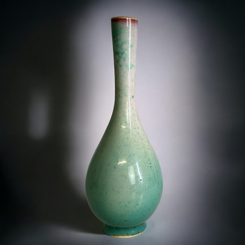 93 - A Chinese Jun 'Peach bloom' glaze porcelain bottle vase.Qing dynasty. Thick Turquoise glaze graduati... 