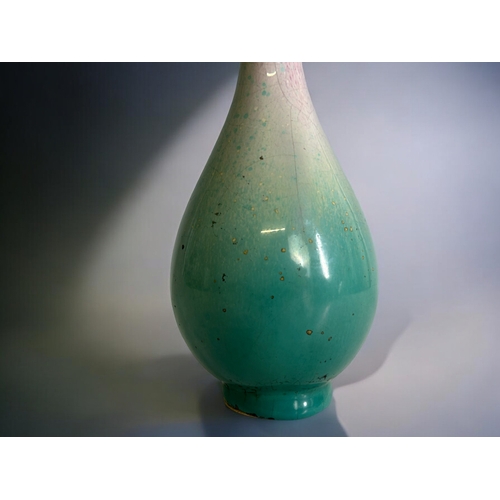 93 - A Chinese Jun 'Peach bloom' glaze porcelain bottle vase.Qing dynasty. Thick Turquoise glaze graduati... 