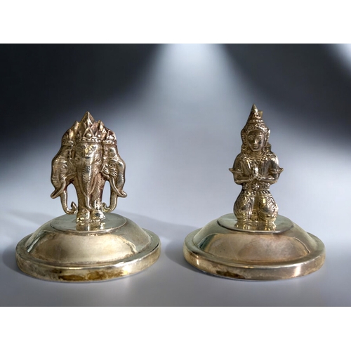 90 - A set of five Siam sterling silver Menu place holders.Depicting various Deities. Together with one o... 