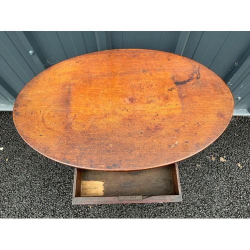 6 - Antique mahogany side table with an oval top and a drawer under.