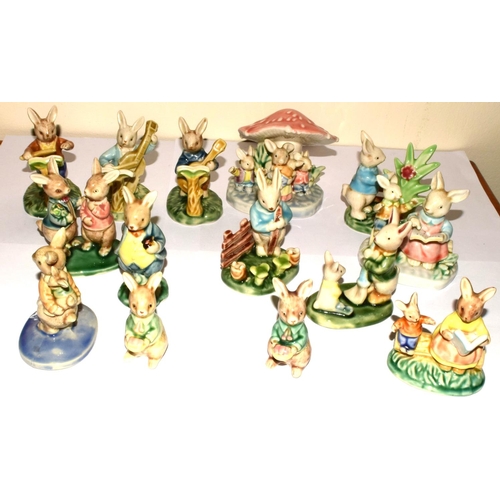 164 - Collection of Vintage porcelain Rabbit family figures many depicting children's story book  figures ... 