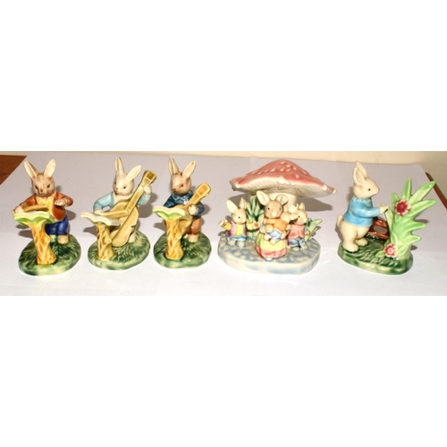 164 - Collection of Vintage porcelain Rabbit family figures many depicting children's story book  figures ... 