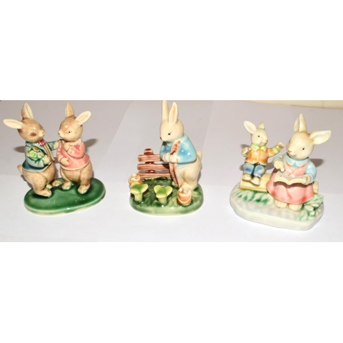 164 - Collection of Vintage porcelain Rabbit family figures many depicting children's story book  figures ... 