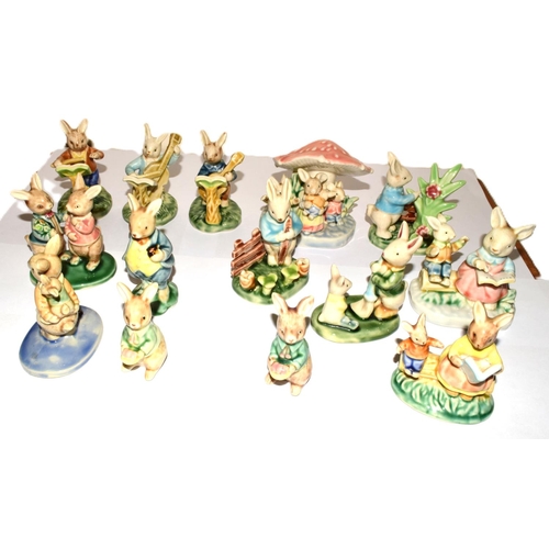 164 - Collection of Vintage porcelain Rabbit family figures many depicting children's story book  figures ... 