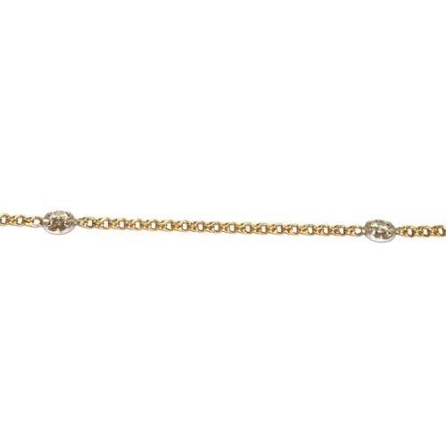 534 - 9ct gold long neck chain set with Diamond roundels 80cm long 9.7g