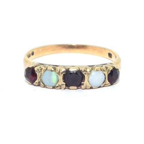 540 - 9ct gold ladies antique Opal and Garnet ring in a scroll setting size N