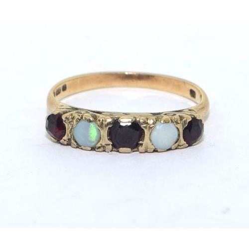 540 - 9ct gold ladies antique Opal and Garnet ring in a scroll setting size N