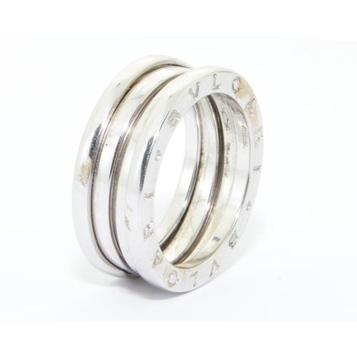 544 - 18ct white gold genuine BULGARI flexible ring hall mark and registration number to the inner size M