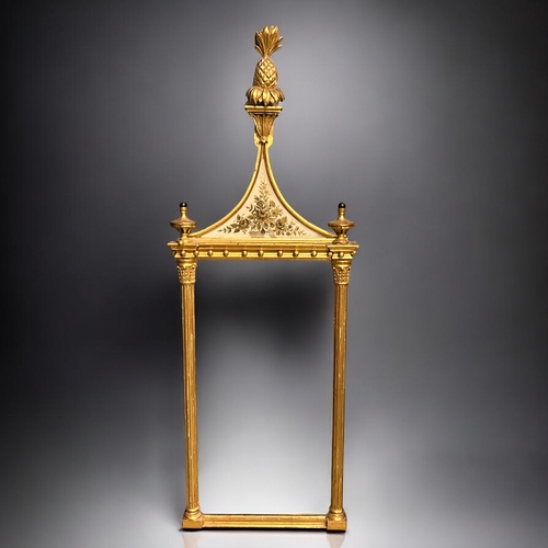 140 - A pair of Giltwood Eglomise Pier mirrors.In the Regency style.Each with Pineapple finials, hung with... 