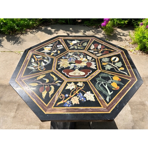 149 - A large Pietra Dura slate table top.Black slate, inlaid with various semi-precious stone. Depicting ... 